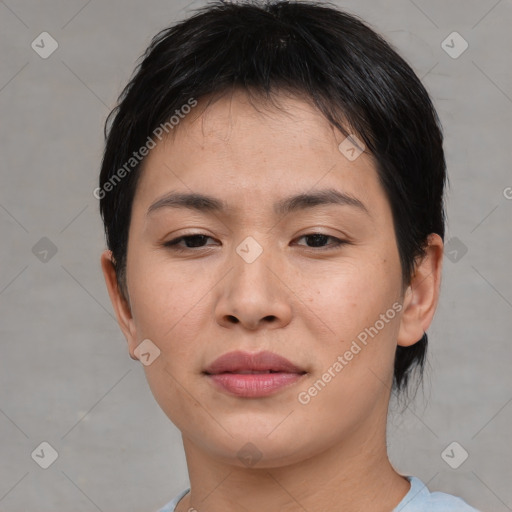 Joyful asian young-adult female with short  brown hair and brown eyes