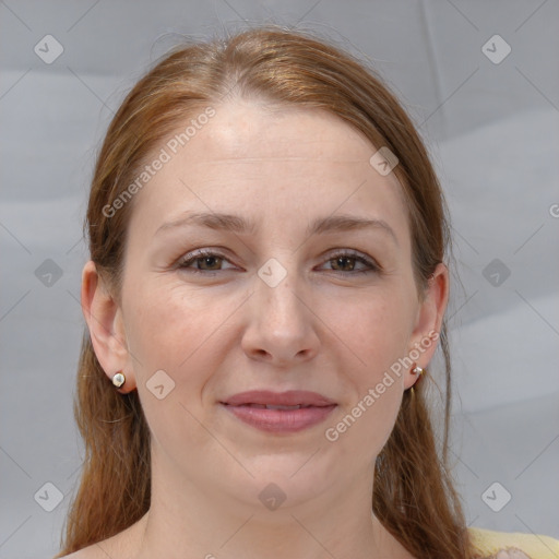 Joyful white young-adult female with medium  brown hair and blue eyes