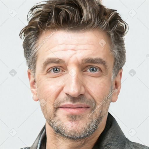 Joyful white adult male with short  brown hair and grey eyes