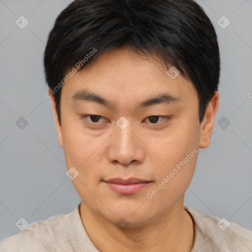 Neutral asian young-adult male with short  brown hair and brown eyes