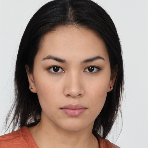 Neutral asian young-adult female with medium  brown hair and brown eyes