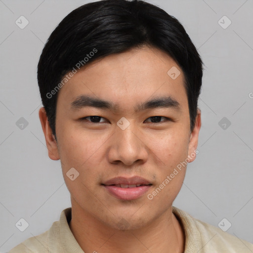 Joyful asian young-adult male with short  black hair and brown eyes