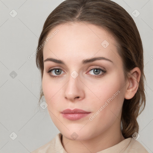 Neutral white young-adult female with medium  brown hair and green eyes