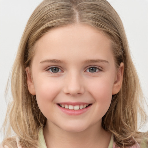 Joyful white child female with medium  brown hair and grey eyes