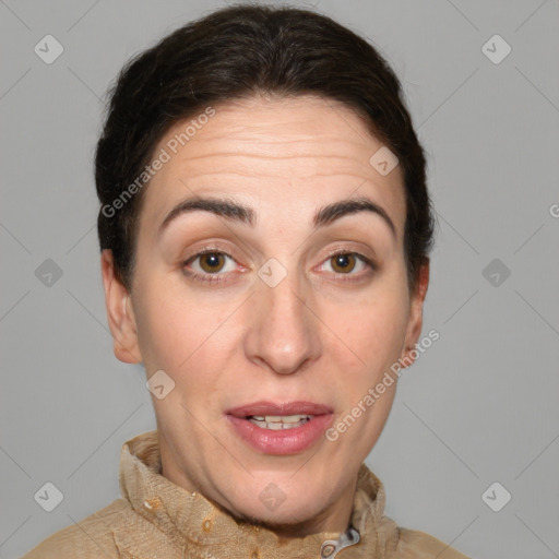 Joyful white adult female with short  brown hair and brown eyes