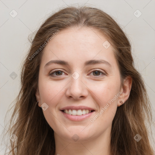 Joyful white young-adult female with long  brown hair and grey eyes