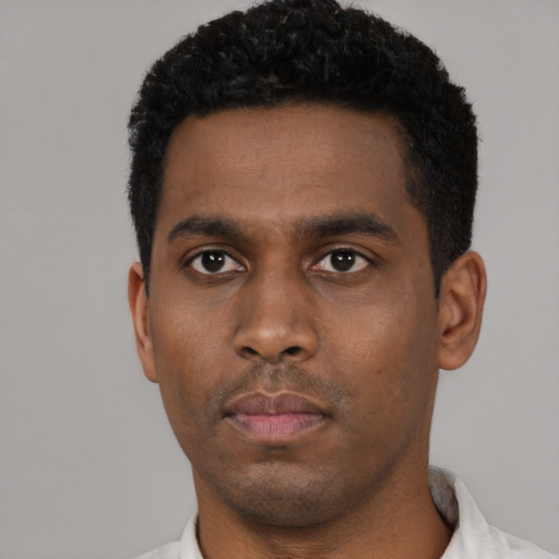 Neutral black young-adult male with short  black hair and brown eyes