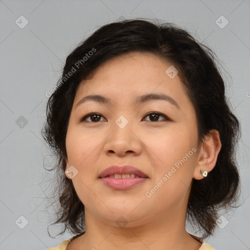 Joyful asian young-adult female with medium  brown hair and brown eyes