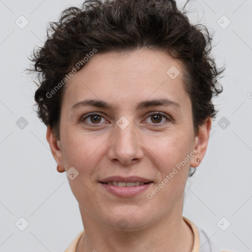 Joyful white adult female with short  brown hair and brown eyes