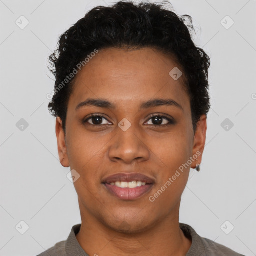 Joyful black young-adult female with short  black hair and brown eyes