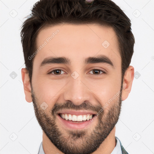 Joyful white young-adult male with short  black hair and brown eyes