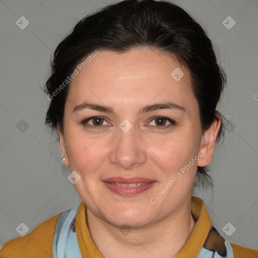 Joyful white adult female with medium  brown hair and brown eyes