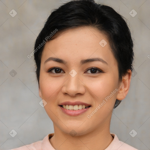 Joyful asian young-adult female with short  brown hair and brown eyes