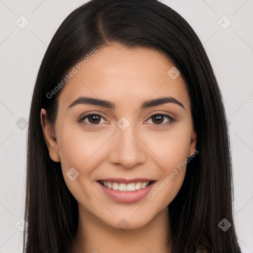 Joyful white young-adult female with long  black hair and brown eyes