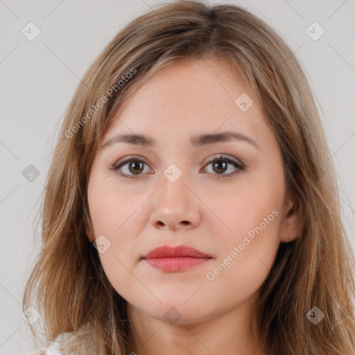 Neutral white young-adult female with long  brown hair and brown eyes