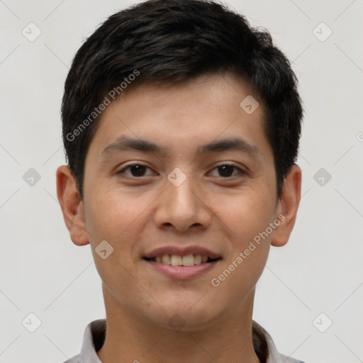 Joyful latino young-adult male with short  brown hair and brown eyes