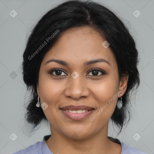 Joyful latino young-adult female with medium  black hair and brown eyes