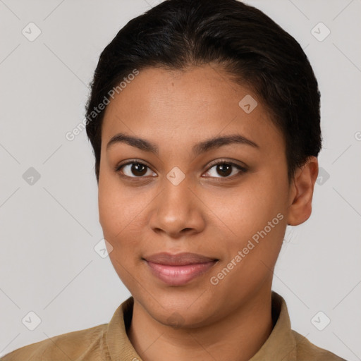 Joyful latino young-adult female with short  brown hair and brown eyes