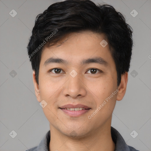 Joyful white young-adult male with short  black hair and brown eyes