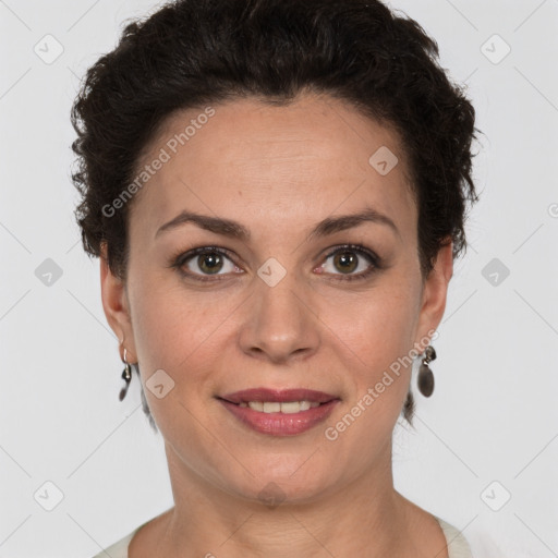 Joyful white adult female with short  brown hair and brown eyes