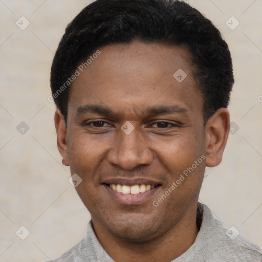 Joyful latino young-adult male with short  black hair and brown eyes