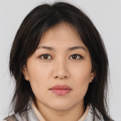 Neutral asian young-adult female with medium  brown hair and brown eyes