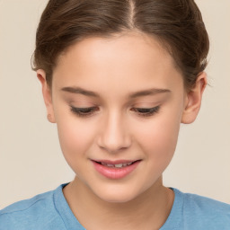 Joyful white child female with short  brown hair and brown eyes