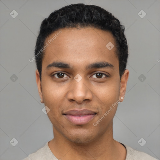 Joyful black young-adult male with short  black hair and brown eyes