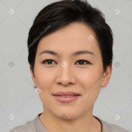 Joyful asian young-adult female with short  brown hair and brown eyes