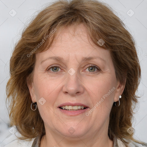 Joyful white adult female with medium  brown hair and blue eyes