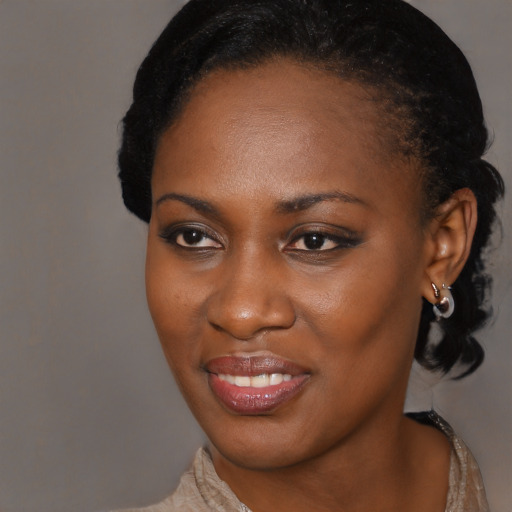 Joyful black young-adult female with medium  black hair and brown eyes