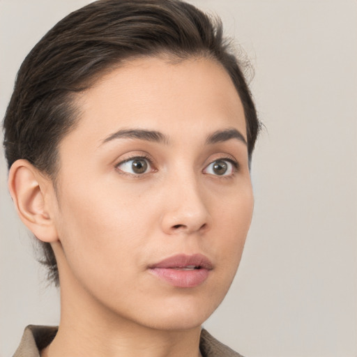 Neutral white young-adult female with short  brown hair and brown eyes