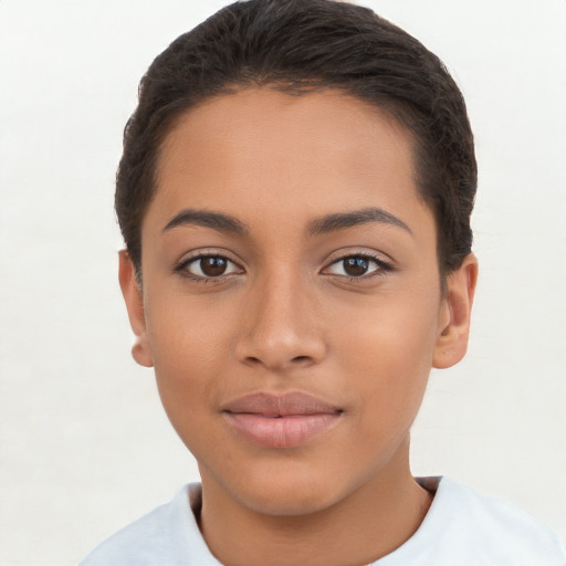 Joyful latino young-adult female with short  brown hair and brown eyes