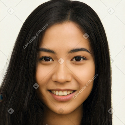 Joyful asian young-adult female with long  brown hair and brown eyes