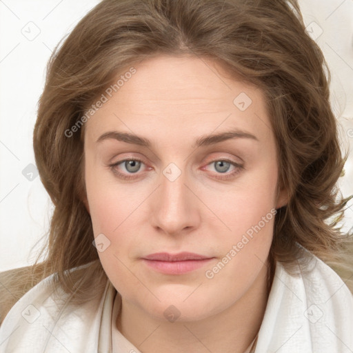 Joyful white young-adult female with medium  brown hair and green eyes