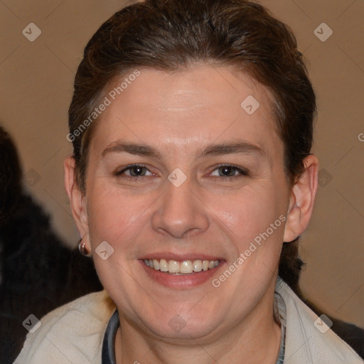 Joyful white adult female with short  brown hair and brown eyes