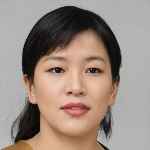 Neutral asian young-adult female with medium  black hair and brown eyes