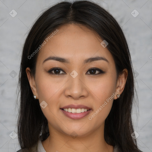 Joyful asian young-adult female with long  brown hair and brown eyes