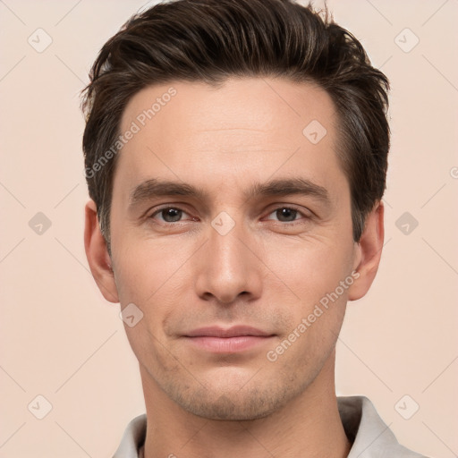 Neutral white young-adult male with short  brown hair and brown eyes