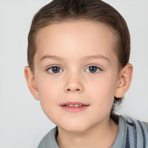 Joyful white child female with short  brown hair and brown eyes