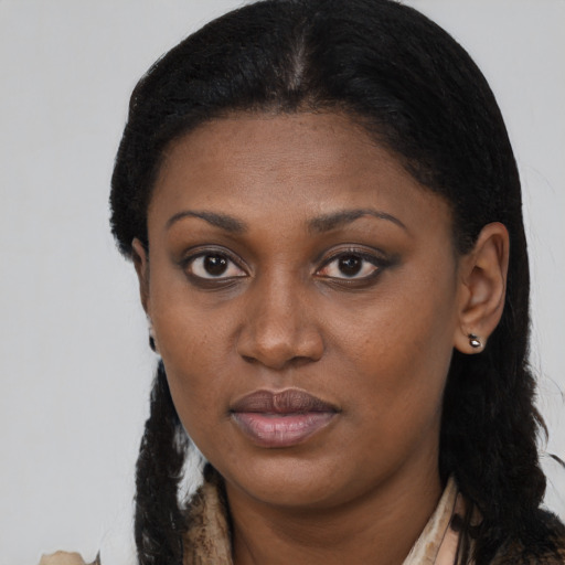 Neutral black young-adult female with long  black hair and brown eyes