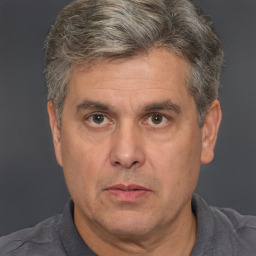 Neutral white middle-aged male with short  brown hair and brown eyes