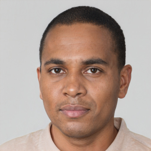 Neutral black young-adult male with short  black hair and brown eyes
