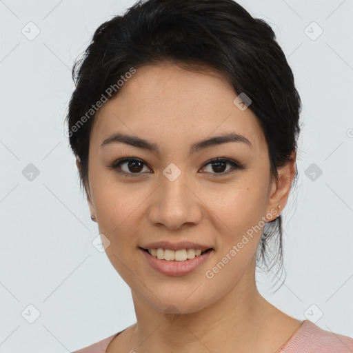 Joyful asian young-adult female with medium  black hair and brown eyes