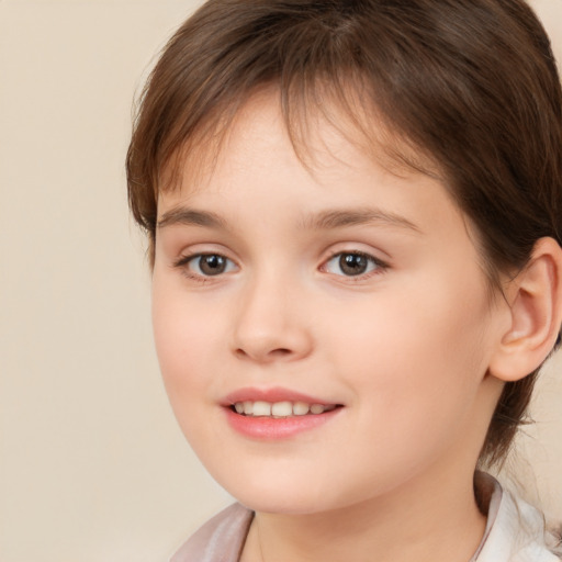 Joyful white child female with medium  brown hair and brown eyes