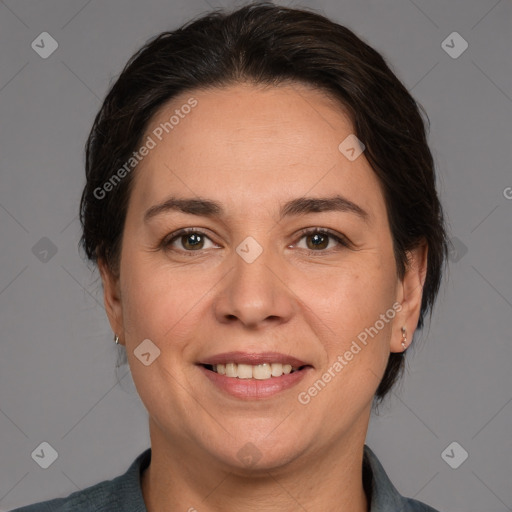 Joyful white adult female with medium  brown hair and brown eyes