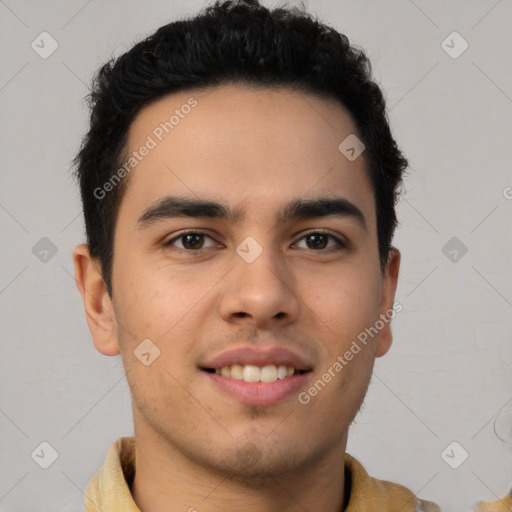 Joyful latino young-adult male with short  brown hair and brown eyes