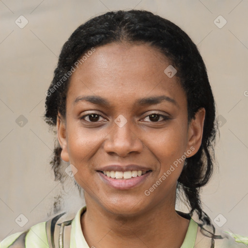 Joyful black young-adult female with short  black hair and brown eyes