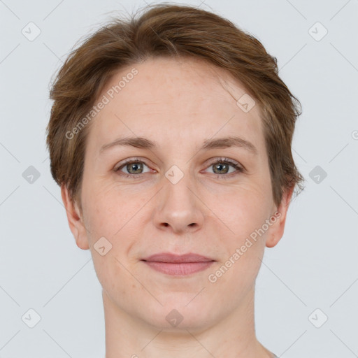 Joyful white adult female with short  brown hair and grey eyes