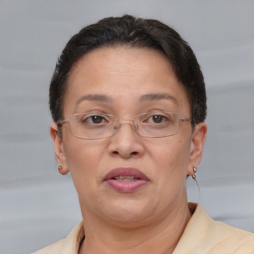 Joyful white adult female with short  brown hair and brown eyes